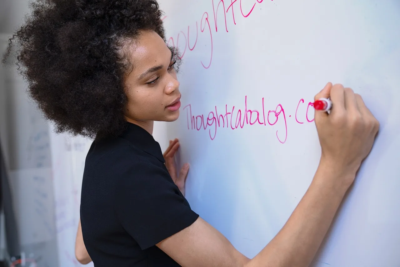 woman, writing, marker, whiteboard, brainstorm, planning, strategy, blue writing, blue plan, blue planning, whiteboard, whiteboard, whiteboard, whiteboard, whiteboard, brainstorm, brainstorm. Product messaging questions: the parts worth your attention